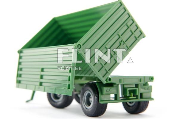 A green toy truck with its cargo bed raised and open.